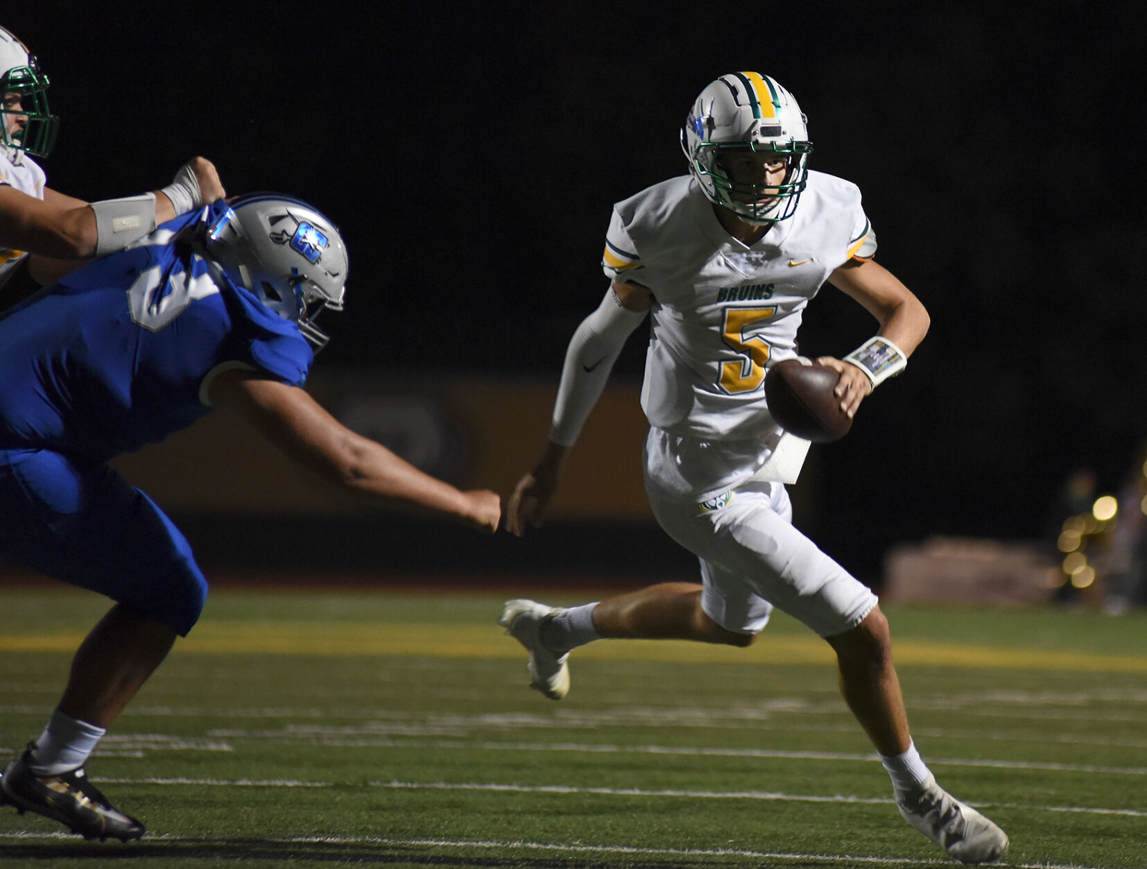 Sam Kaiser runs past his opponent on Friday